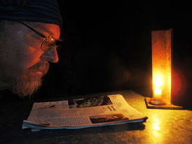 Reading by candlelight