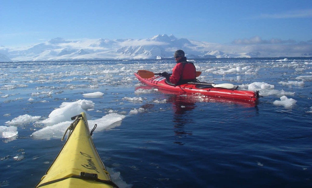 Katja kayaking from Nansen Island to Orne Bay, Antarctic Peninsula