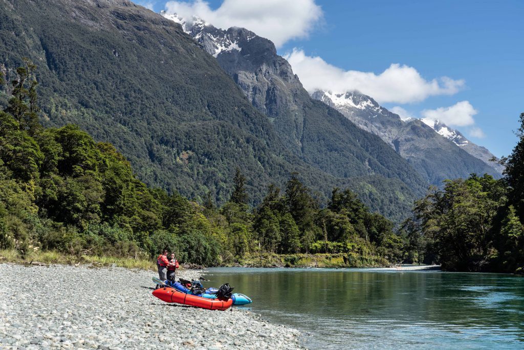 Taking a short rest on the paddle down the Hollyford River