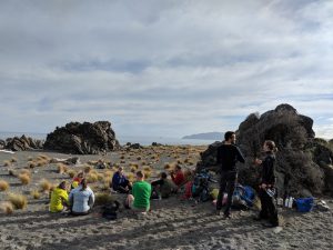 Resting on the beach at Baring Head