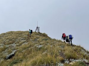 Loretha, Jane, Jamie, and Anna reach the Tunupō trig