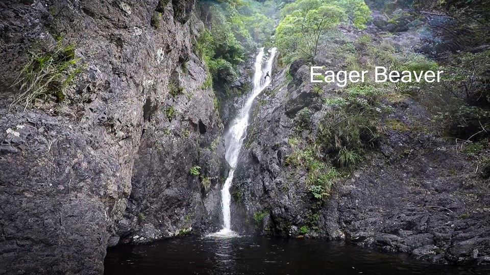 Rappelling the final big waterfall Eager Beaver Canyon, Waiorongomai