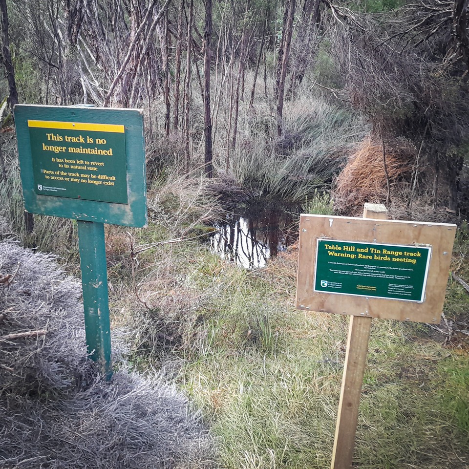 Tin Range track warning signs