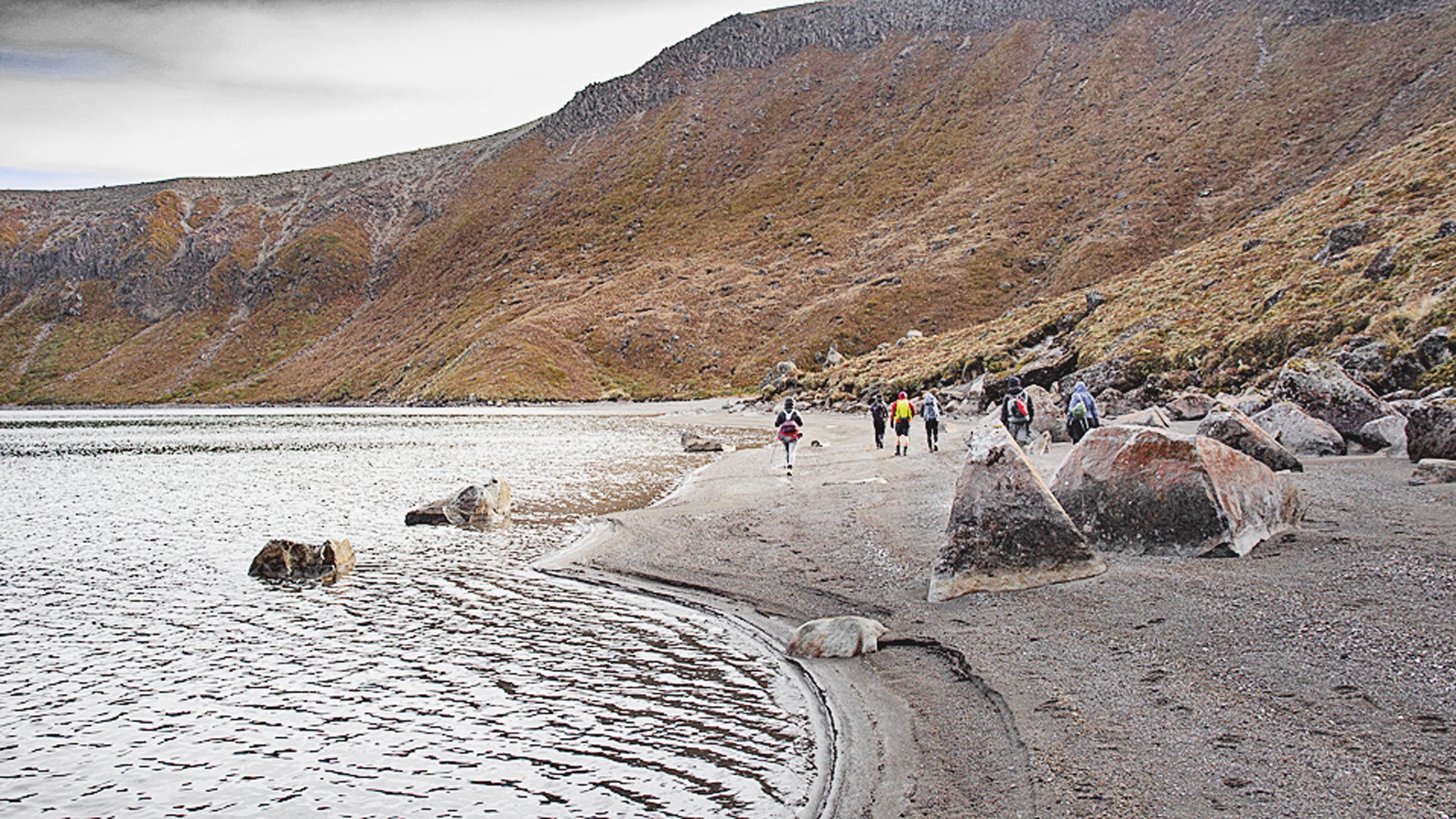 Walking along the shore of Upper Tama Lake, Tongariro National Park