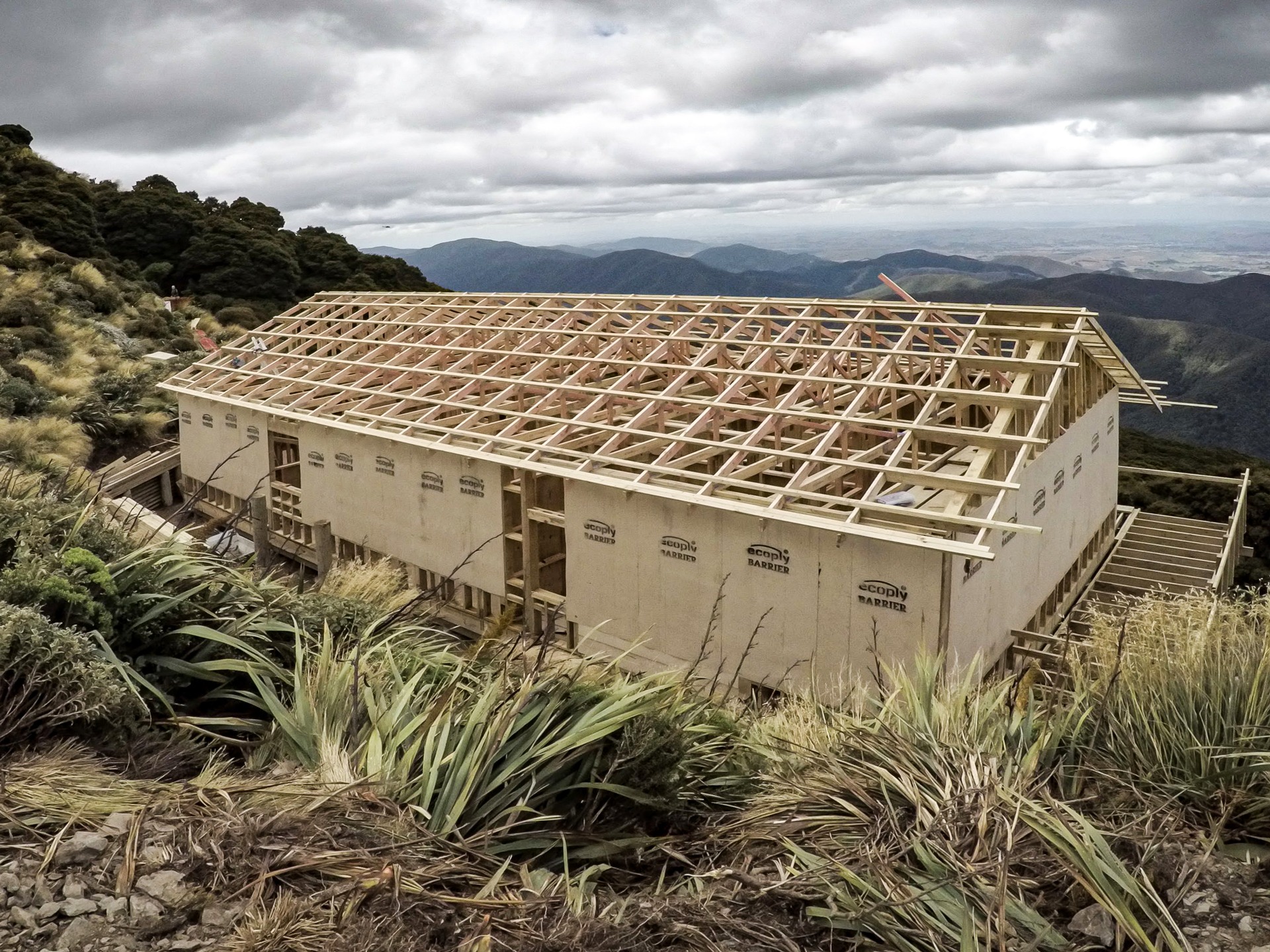 Powell Hut rebuild 2019 showing floor, walls, and roof framing complete. RAB started to walls