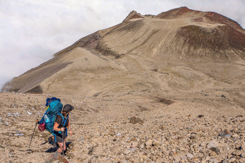 Climbing the south side of Mt Taranaki with Fanthoms Peak below
