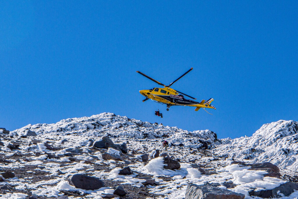 Lifting one of the stuck trampers from the south slopes of Mt Taranaki
