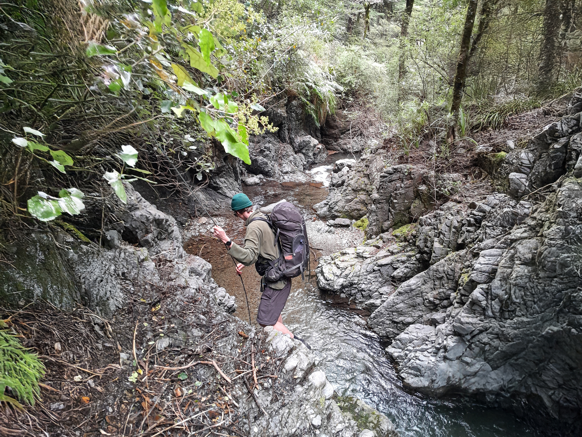  Descending a helpful rope in the Ruahine Range 