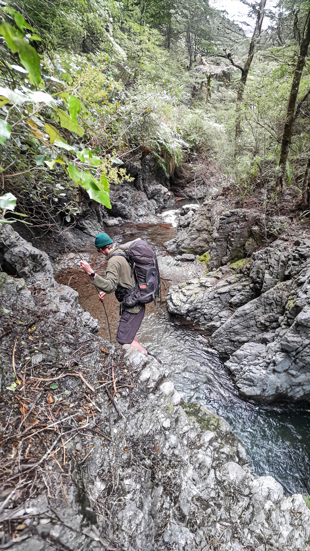  Descending a helpful rope in the Ruahine Range 